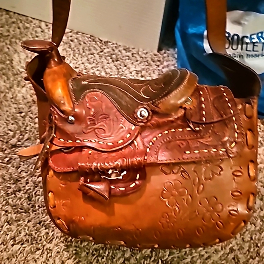 Hand made one of a kind genuine leather Sadlle bag.